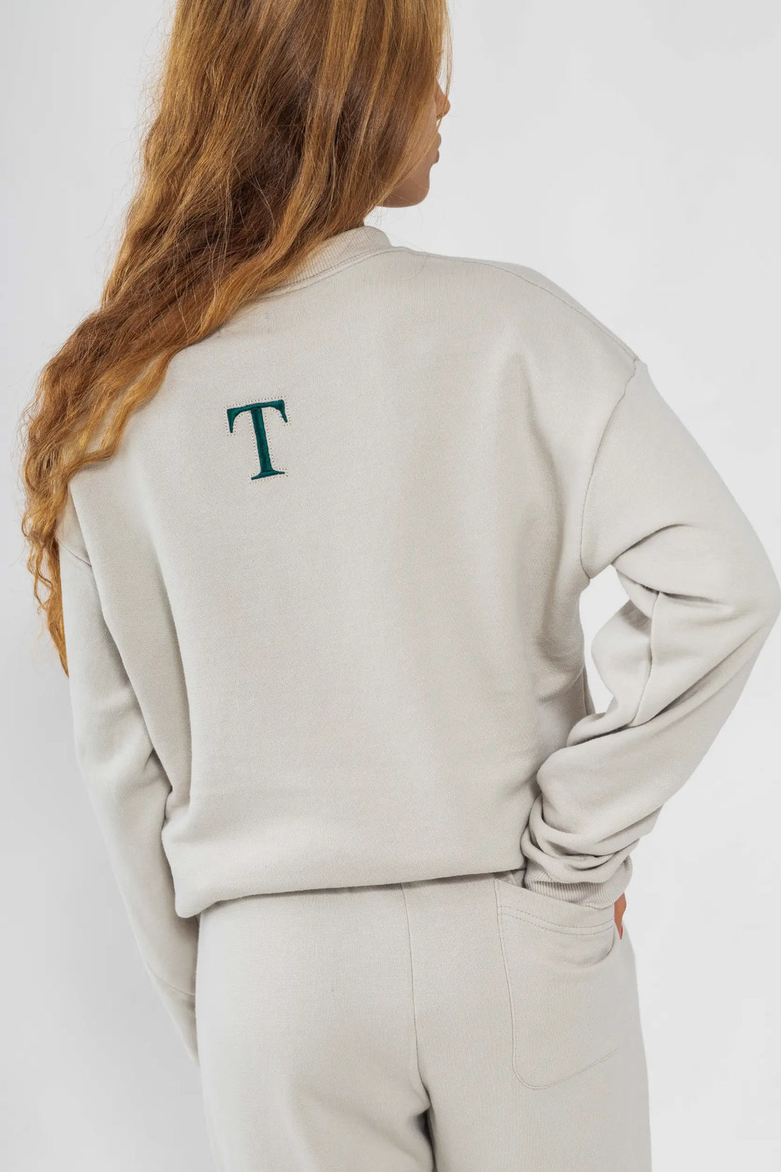 אבן T - סווטשירט בוקלה לנשים