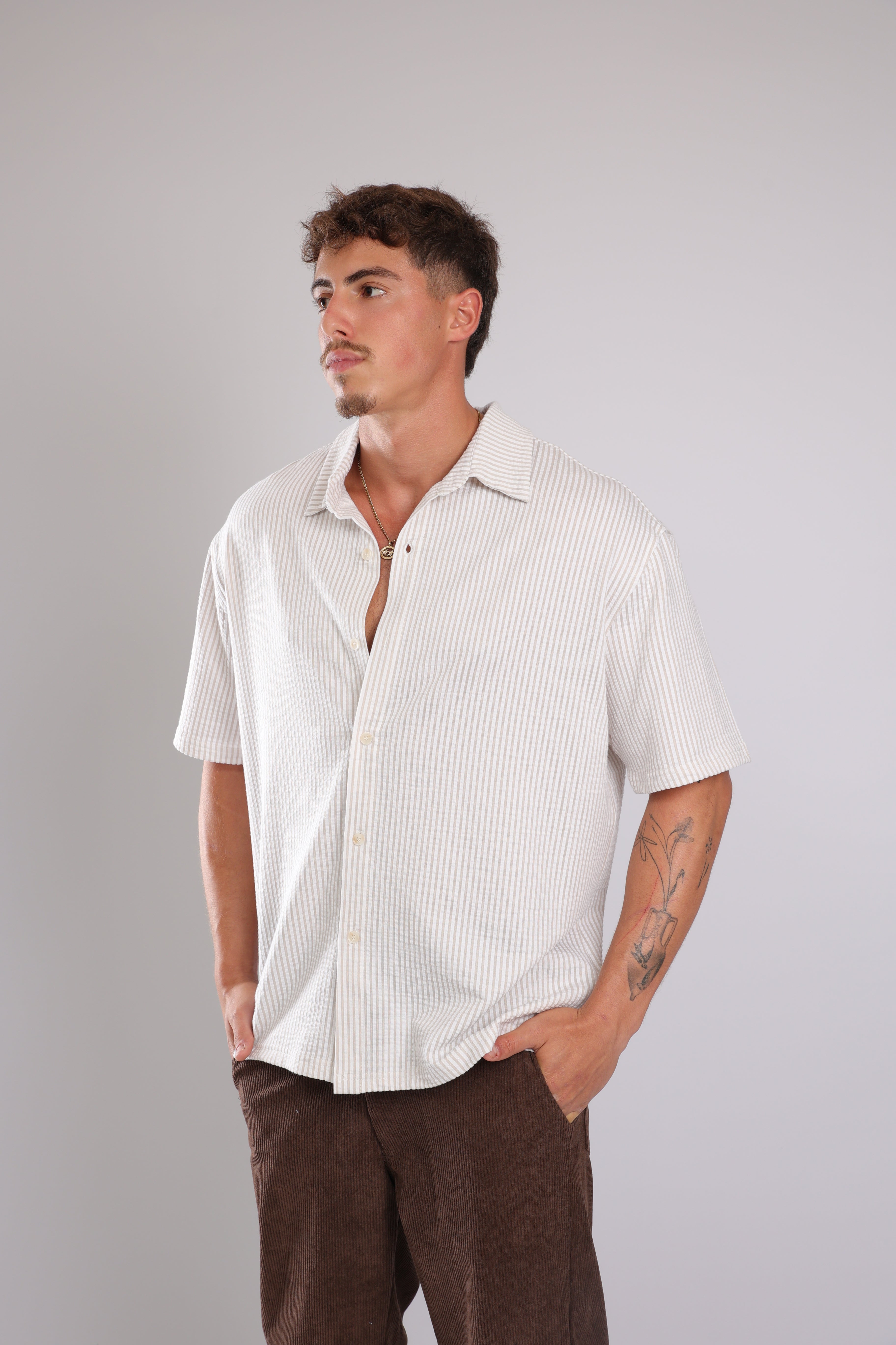 מכופתרת קצרה פסים - שמנת